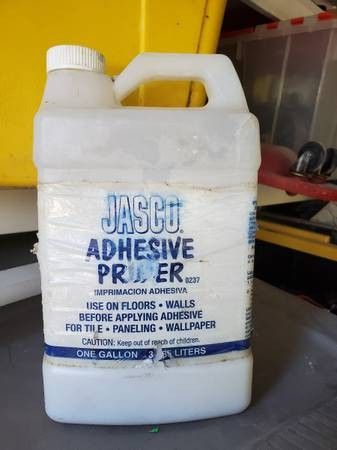 Adhesive primer 3/4 full