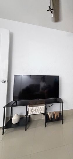 Black TV Stand with Power Outlets (TV not included)