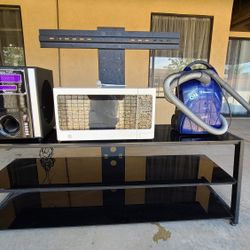 Tv Stand, Microwave, Speaker, Vacuum And Heater