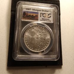   1887 Morgan silver dollar Uncirculated Graded Brilliant