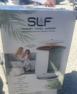 Brand new SLF luxury  towel warmer