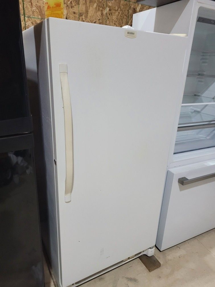28 X 60 Inch Tall Freezer Good Working 