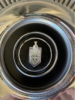 Vintage hubcaps-two total
