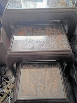Antique oriental nesting tables hand carved