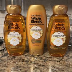 set of 3 garnier whole blends illuminating shampoo (2) w conditioner•all for $10