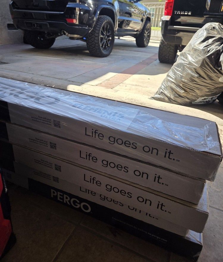 5 Boxes Of Pergo Flooring