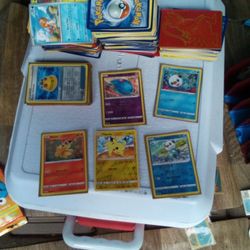 About 300 Pokemon Cards