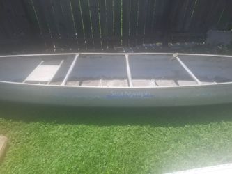 Flat bottom canoe with brand new oars