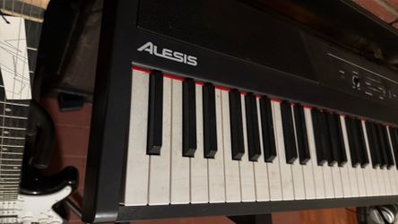 Alesis recital piano with stand and head phones