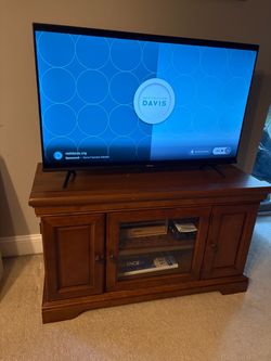 Brown mini entertainment stand
