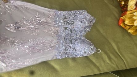 Light purple long dress with corset included, (xxs) only used once. Heads-up it’s a dirty from the bottom but with a deep clean from only the bottom i