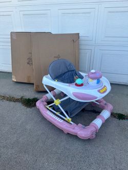 Pink baby walker at Rialto