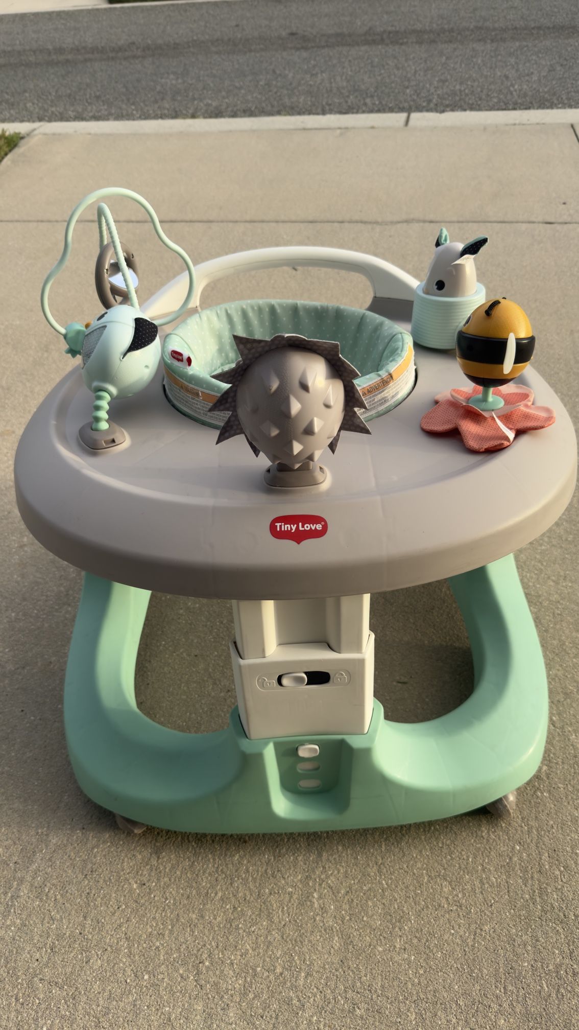 Selling a Tiny Love activity center.