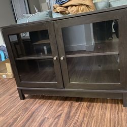 Dark Wooden Cabinet With Glass Doors 