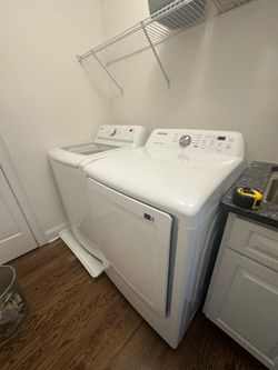 LG High-Efficiency Washer + Samsung Sensor Dry Electric Dryer White
