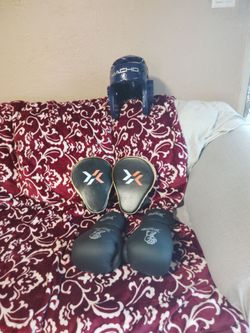 Boxing gloves  and helmet and the other thing for boxing