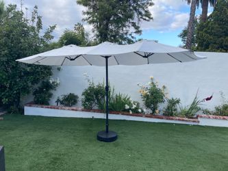 Outdoor umbrella and base