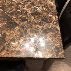 BEAUTIFUL DINETTE - MARBLE LOOK 5 FOOT TABLE ALONG WITH 4 LEATHER CHAIRS  $225