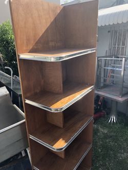 Corner tall wood shelving unit