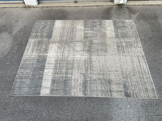 Area Rug -( rectangular size: 7’10” x 10’ - gold/beige colored )- Used like new 