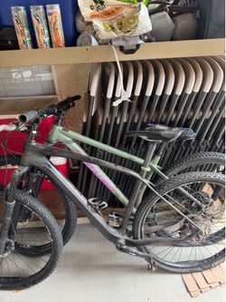 Black Chinese carbon fiber mountain bike.