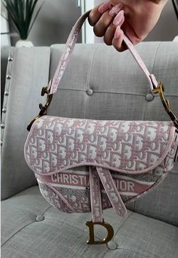 CD pink saddle purse