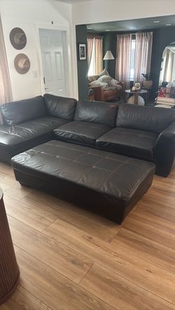 L shaped couch + ottoman