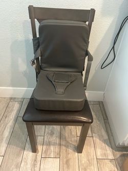 Booster seat for dining table chair