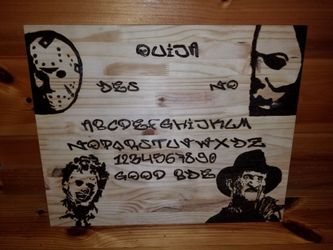 Custom hand made to order Ouija Boards,signs,etc..