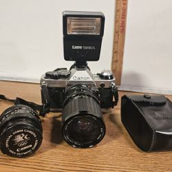 Canon AE-1 35mm Film Camera With 2 Lenses And Canon Flash READ. Watch Video Demo
