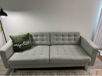 Morabo ikea sofa with a coffee table and ottoman