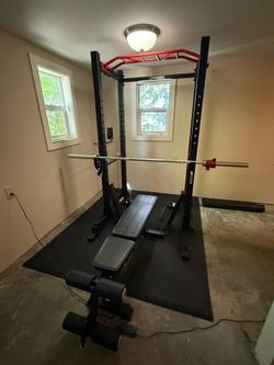 Squat rack, bench, and plates