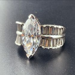 .925 Sterling Silver Marquise Cut,Cubic Zirconia Center Stone With Cubic Zirconia Baguettes. Size:6