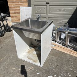 Laundry/utility Sink In Cabinet With Faucet And Legs