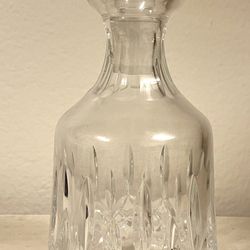WATERFORD Lismore Decanter. Crystal pattern with signature diamond and wedge cuts. Slant cut on its crystal stopper. 