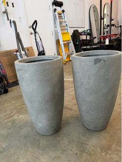 Tall matching stone planter pots