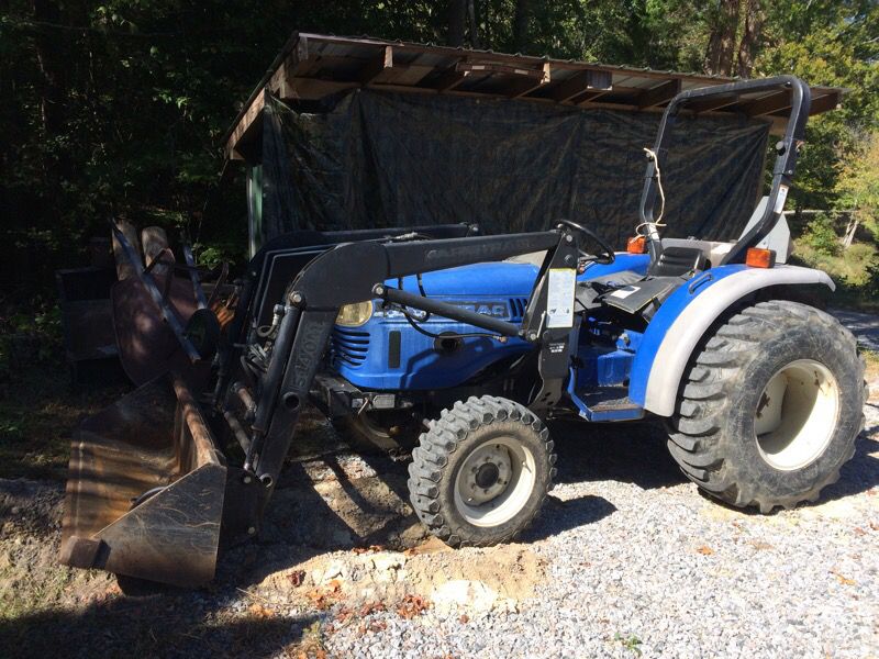 Farm trac 30 hp... low miles!!!(also have bush hog and boom)
