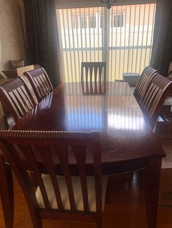 Dining room table with six chairs