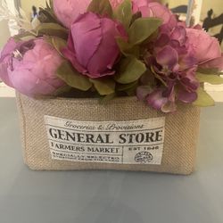 Silk Flowers In Burlap Container