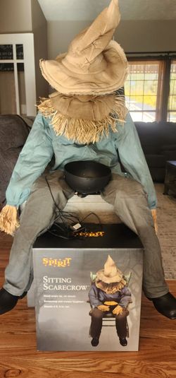 Sitting scarecrow