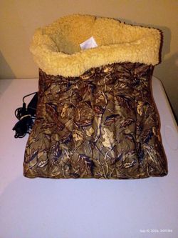 Shavel electric foot warmer with Sherpa lining.