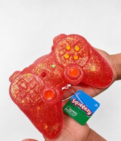 Trending Squeeezy Glitter Game Controller Squishy Toy