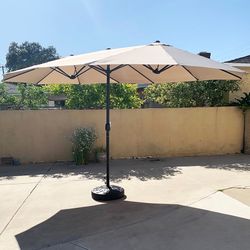 Brand New $130 Large 15 FT Double Sided Outdoor Umbrella with 65 LBS Plastic Weight Base (Beige color)