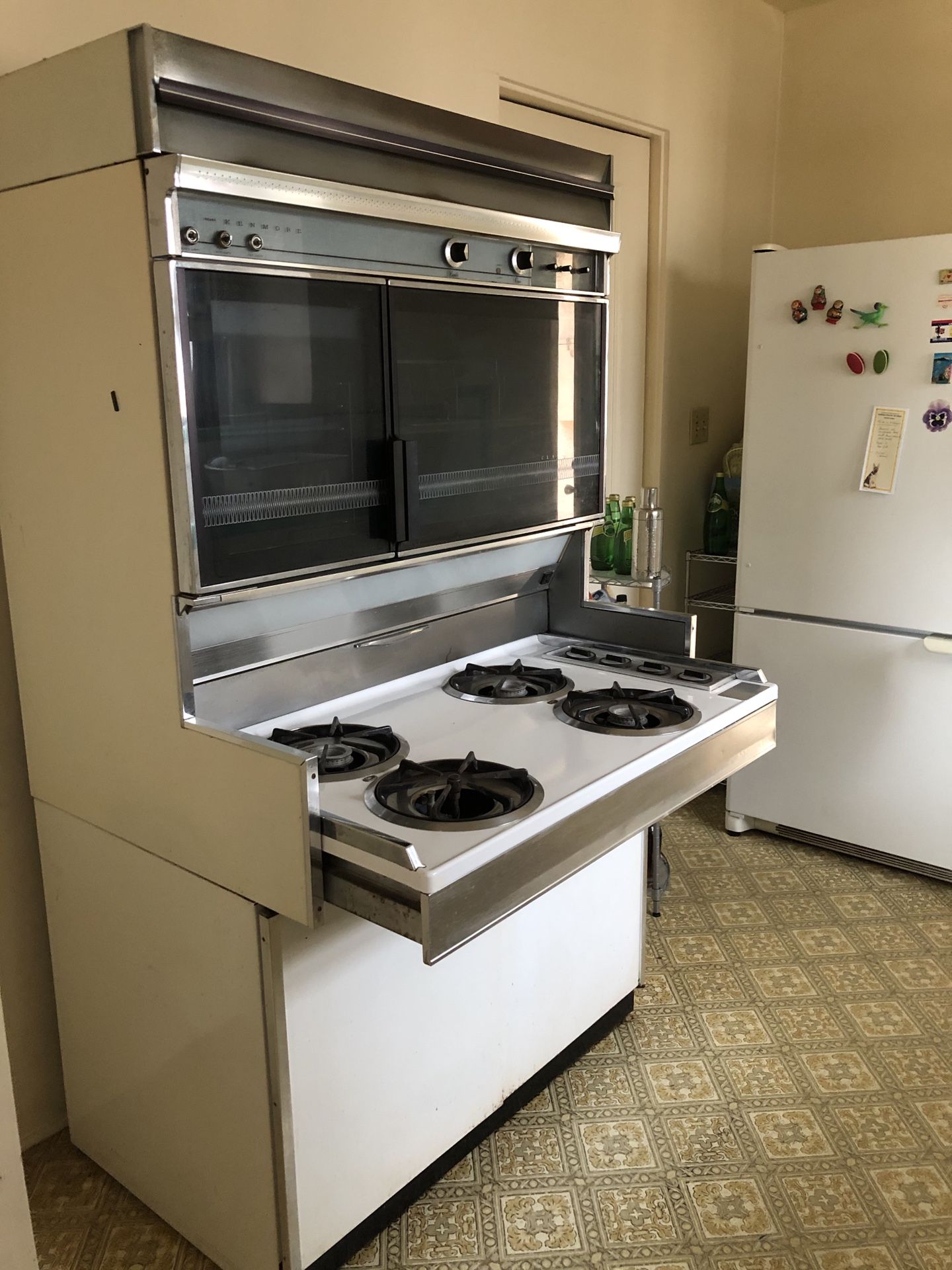 Free! Early 60’s Sears Kenmore Classic Range with Oven and Broiler with storage underneath and retractable range with cover