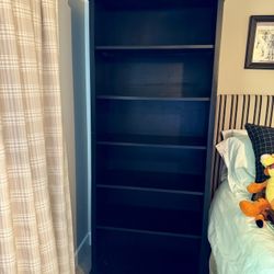 Black bookcase and bookcase desk