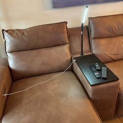 Saddle 5-piece dual power reclining Modular sectional with media consoles. 