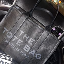 Brand New Tote Bag . Comes With Cover Doesn’t Have The Tags 