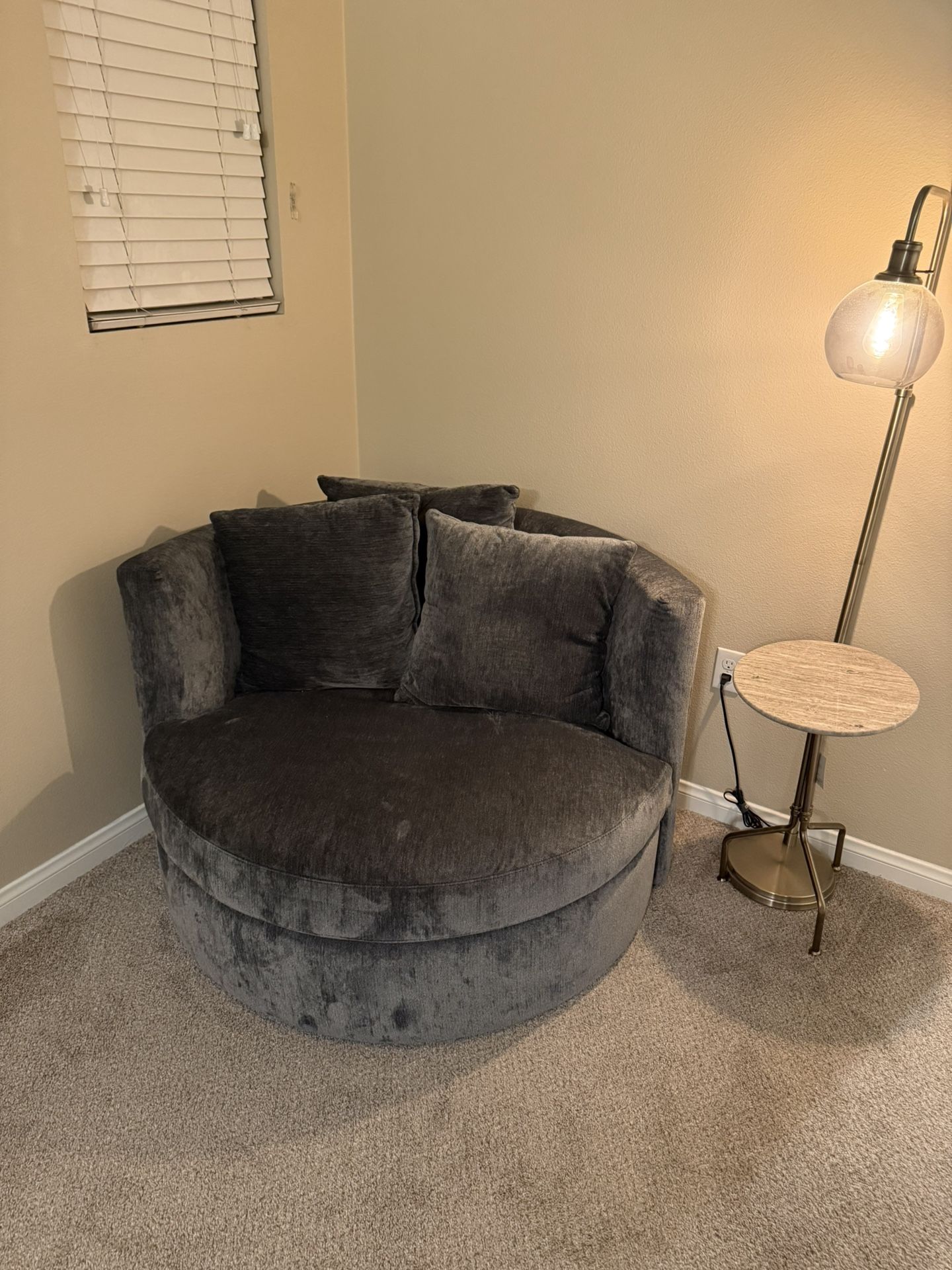 Living Spaces Oversized Swivel Chair