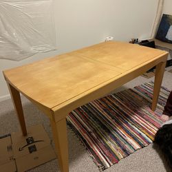 Cool Accordion extending Dining Table