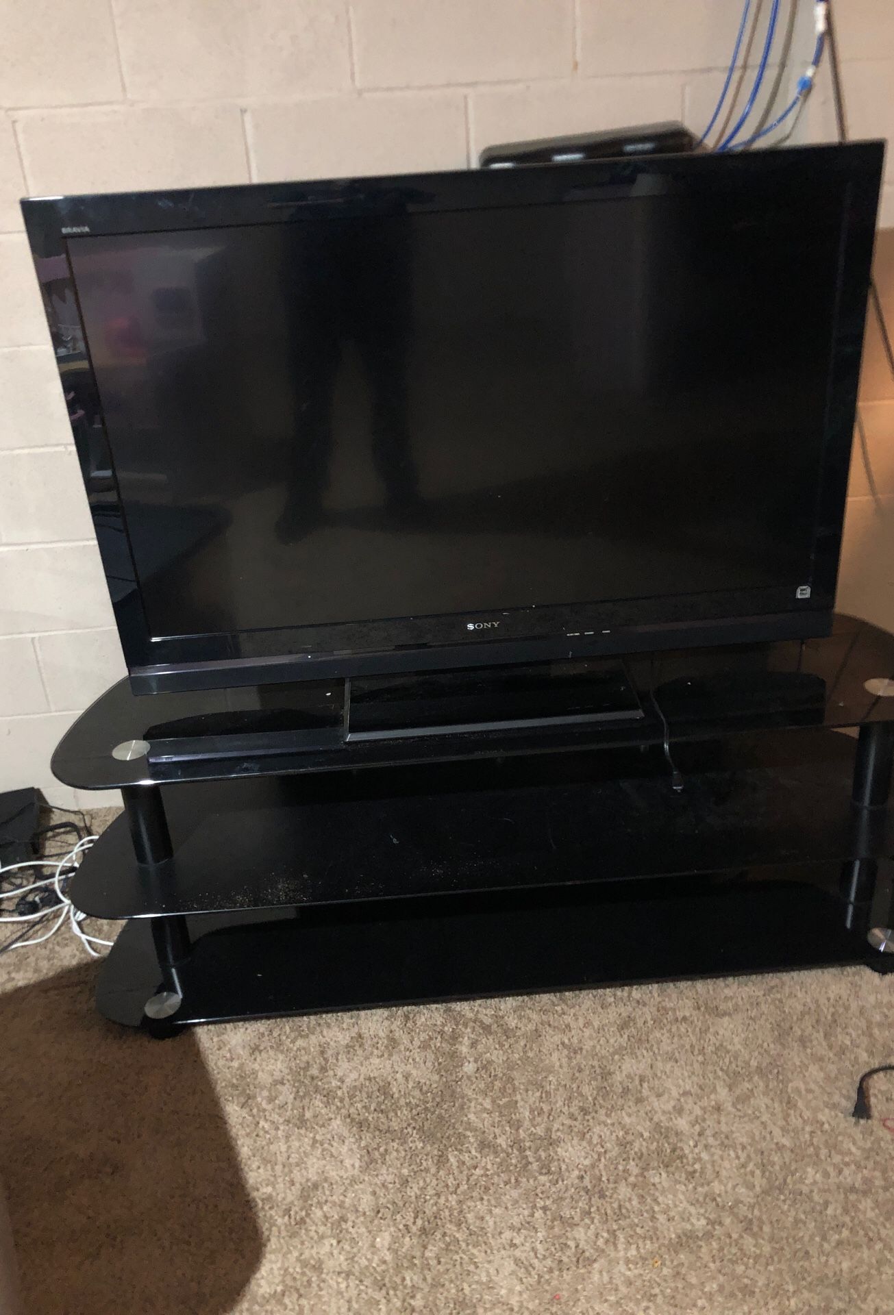 Sony 50 inch and nice glass tv stand